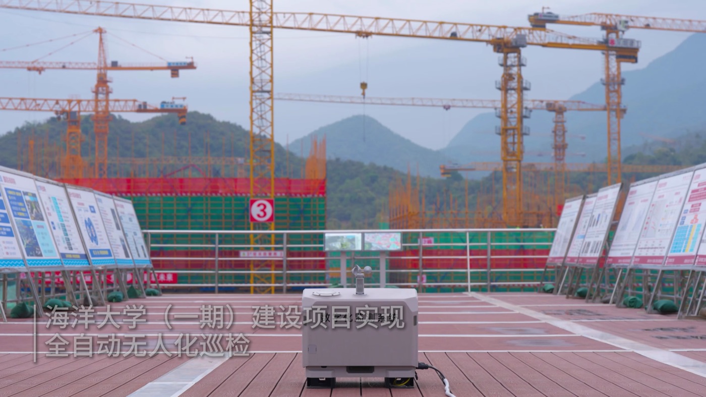 Construction site with tower cranes and inspection equipment